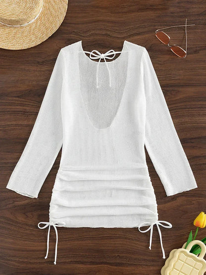 Gehäkeltes Langarm-Strandkleid – stylisch, luftig & perfekt für heiße Tage