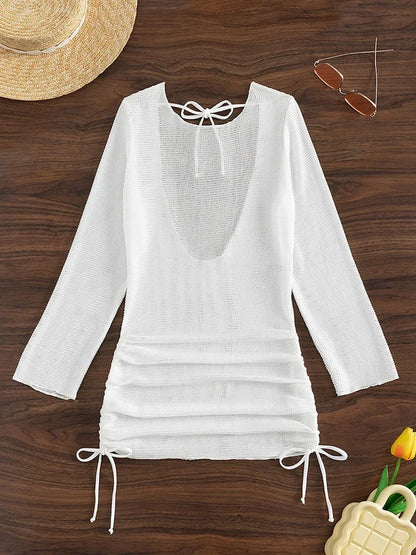 Gehäkeltes Langarm-Strandkleid – stylisch, luftig & perfekt für heiße Tage